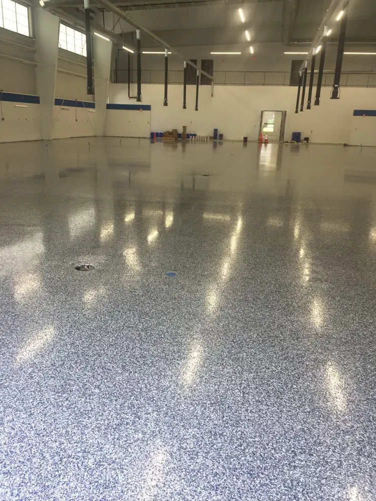 Epoxy flake broadcast system